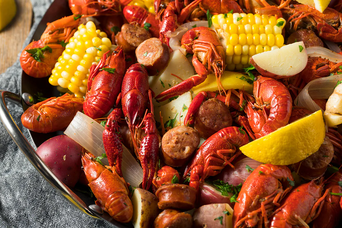 Cajun crawfish boil with corn and sausage at Crab House, a Cajun Seafood Restaurant in Modesto