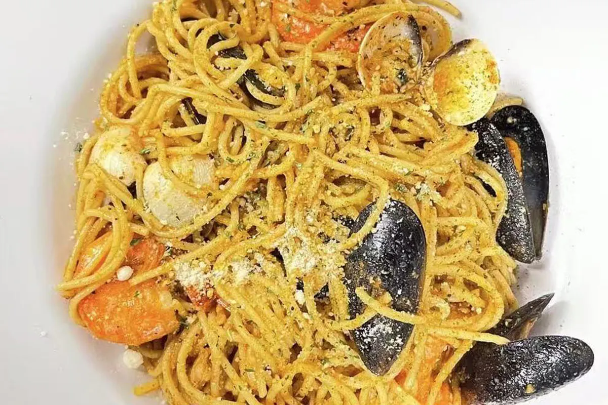 Seafood pasta with mussels and clams at Crab House, a Cajun Seafood Restaurant in Modesto